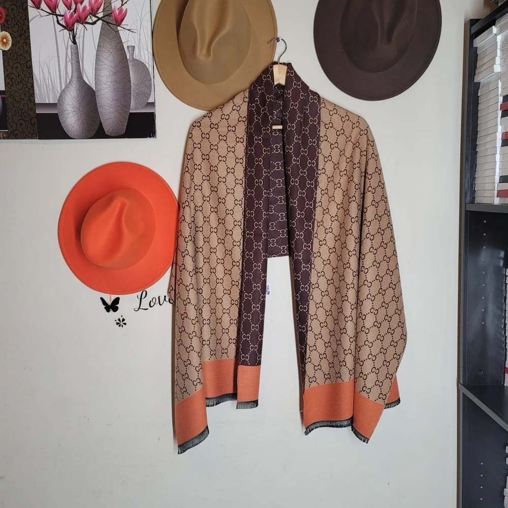 Elegant Brown and Orange Patterned Scarf